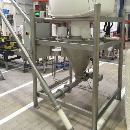 Ensemble pour le transfert des poudres d'écoulement fluctuant