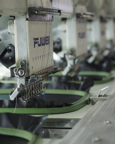production planning and the complexity of handling textile materials